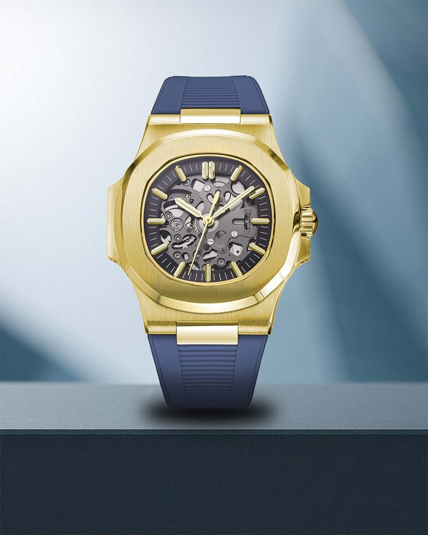 Nomods Aquanaut-Inspired Seiko Mod with Gold Finish and Blue Rubber Strap